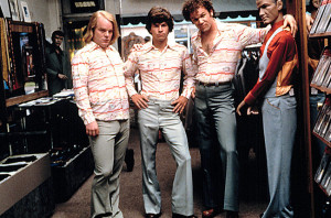 Philip Seymour Hoffman, Mark Wahlberg, and John C. Reilly in Boogie Nights